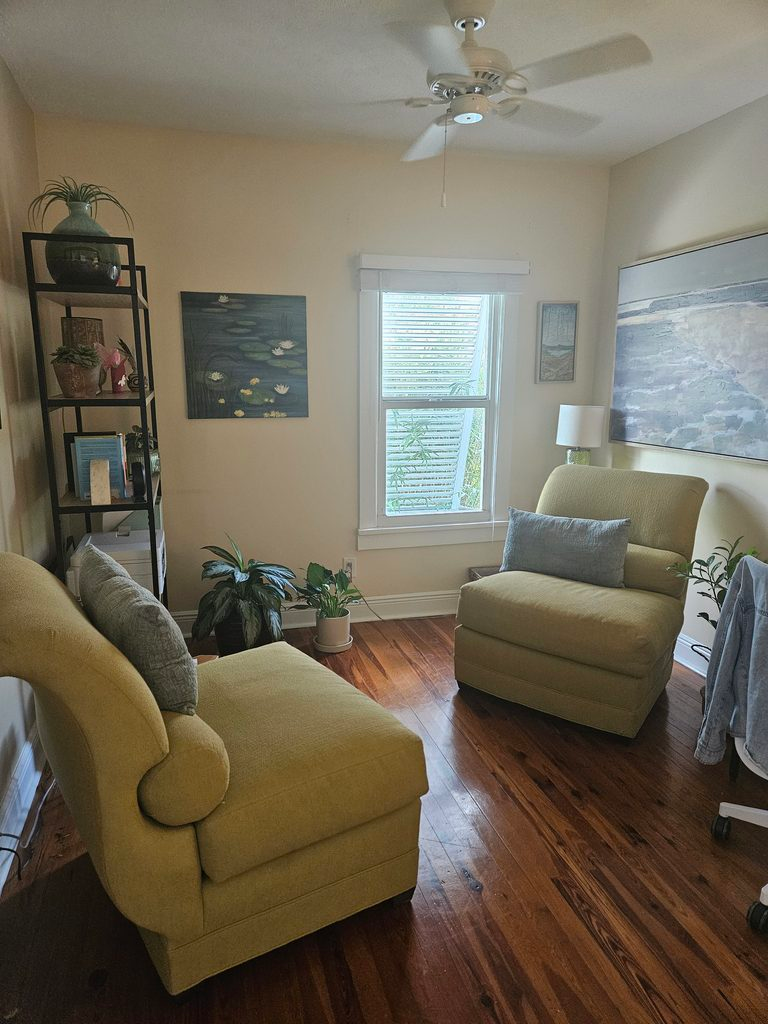 Warm, welcoming traditional therapy office room for indoor counseling sessions in Stuart, Florida.